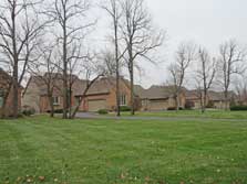 tree-lined setting and front yards