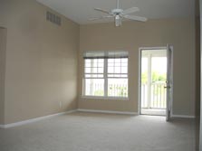 great room with doorwall to deck