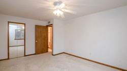 master bedroom with walk in closet