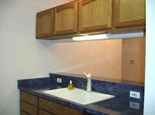 galley style kitchen with breakfast bar/counter