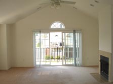 great room with doorwall to deck