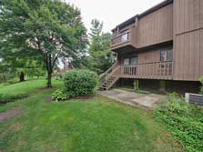 deck & patio overlook lush landscaping