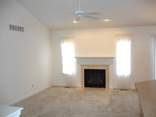 Great Room with firepace & side windows